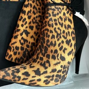 Over the knee Leopard boots. Brand new never worn.